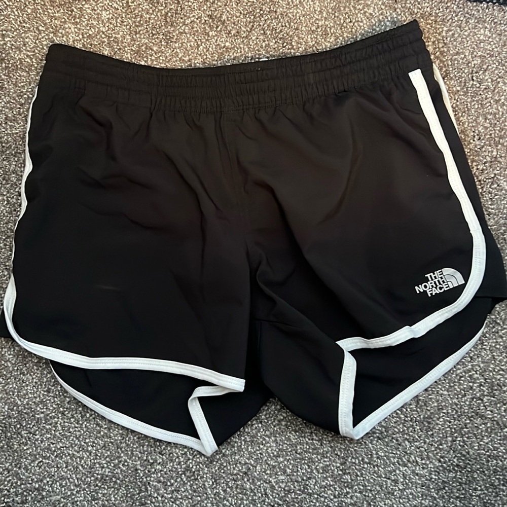 North face shorts - black with white stripes on side - size small